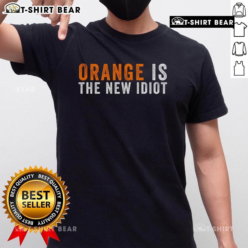 Top Orange Is The New Idiot T-Shirt featuring bold text design, perfect for casual wear and making a statement.