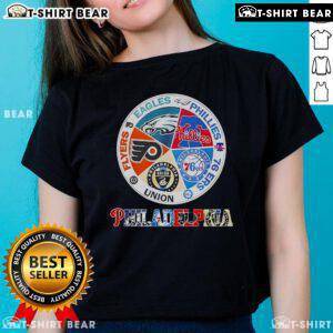 Top Philadelphia teams ladies tee featuring Flyers, Eagles, Phillies, 76ers, and Union logos in vibrant colors.
