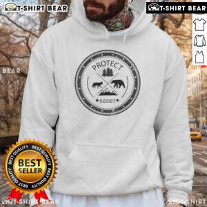 Top Protect Resist National Parks and Forest Service Hoodie in forest setting, promoting conservation and outdoor adventure.