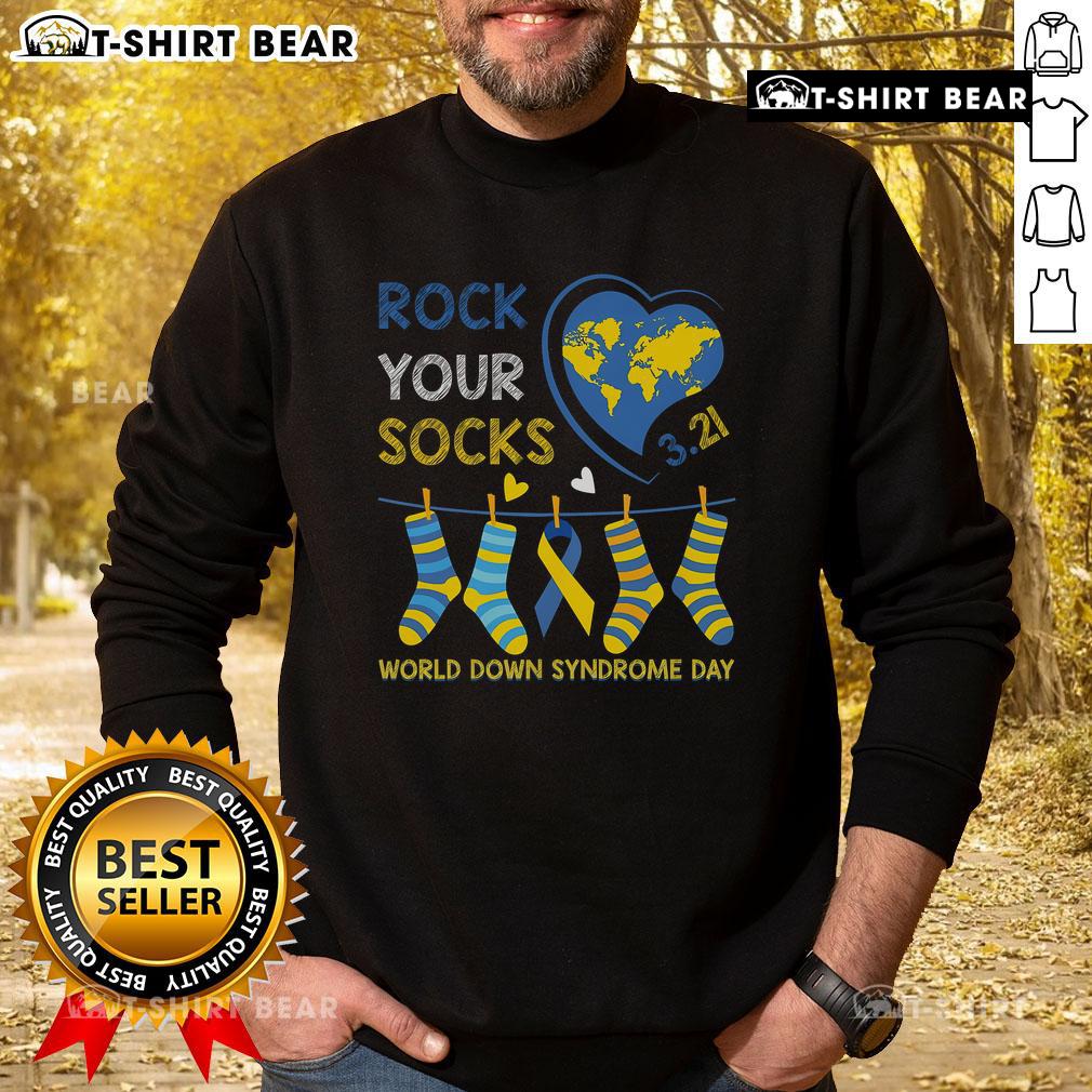 Cozy sweatshirt for World Down Syndrome Day featuring 'Top Rock Your Socks' design, promoting awareness and inclusion.