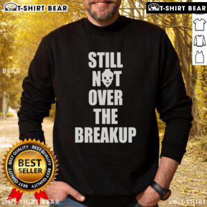Cozy 'Top Still Not Over The Breakup' sweatshirt in soft fabric, perfect for staying comfy while healing from a breakup.