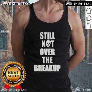 Trendy 'Top Still Not Over The Breakup' tank top in black with bold lettering, perfect for expressing your feelings stylishly.