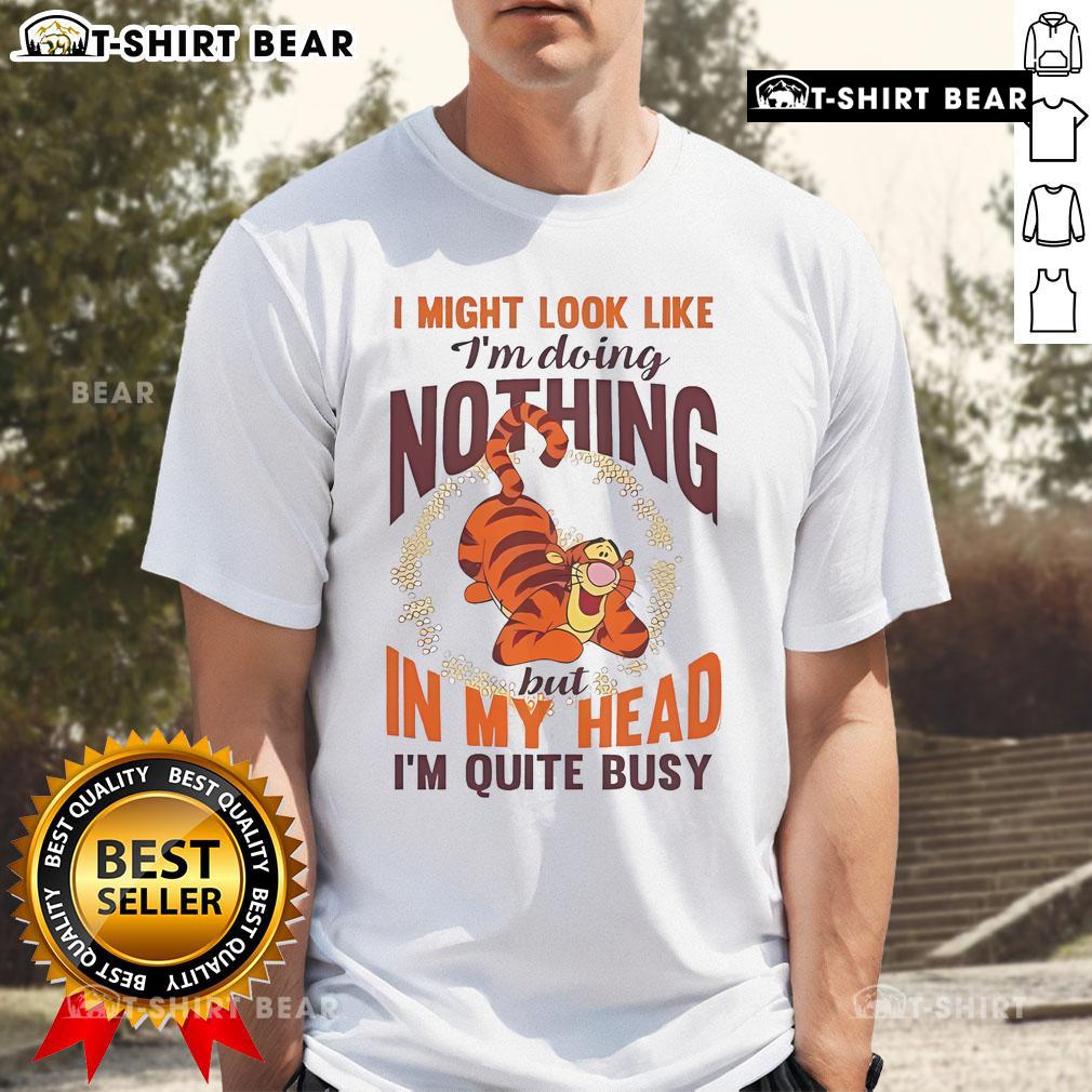 Alt Text: Top Tigger I Might Look Like I'm Doing Nothing But In My Head I'm Quite Busy T-Shirt design featuring playful graphics.