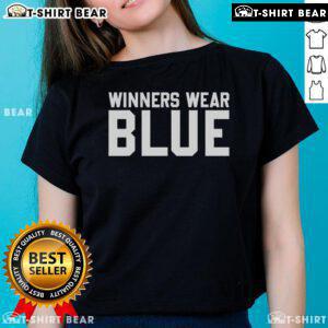 Top winners wear blue ladies tee, showcasing stylish women in vibrant blue shirts celebrating their achievements.