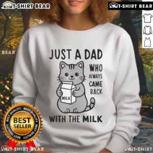 Cute cat wearing a 'Just a Dad Who Always Came Back with the Milk' sweatshirt, showcasing playful pet fashion.
