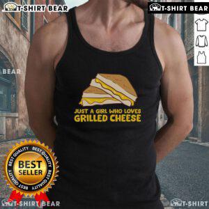 Girl wearing a tank top with 'Just a Girl Who Loves Grilled Cheese' design, enjoying a delicious grilled cheese sandwich.