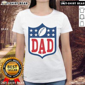Happy dad wearing an American football ladies tee, celebrating with family at a game, showcasing team spirit and joy.