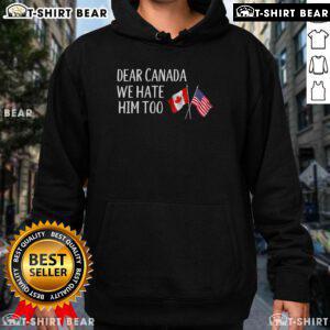 Alt Text: Anti-Trump hoodie featuring USA and Canada flags, expressing shared sentiments against Trump in bold design.