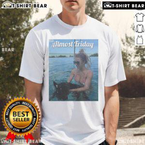 Alt Text: Official Almost Friday Sweeney Puppy T-Shirt featuring a playful puppy design, perfect for casual wear.