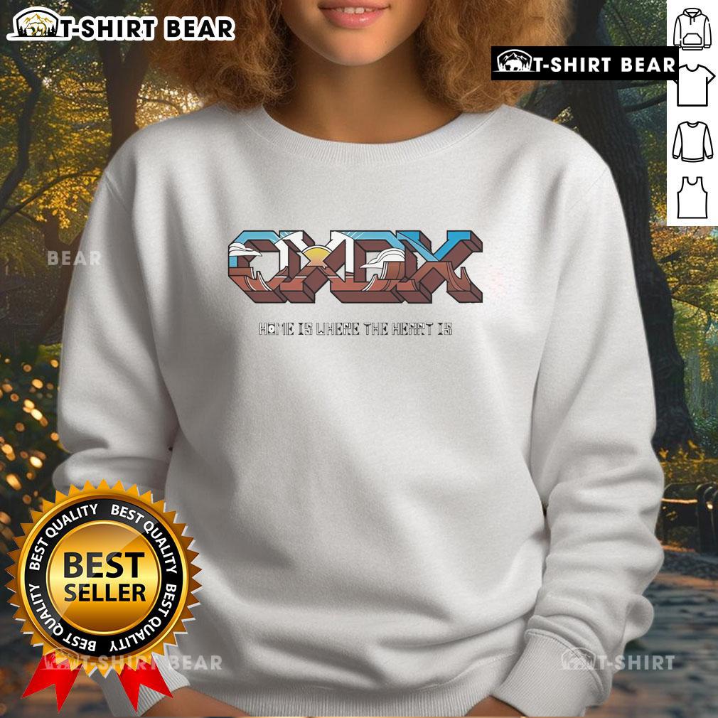 Official Oxdx 'Home Is Where The Heart Is' sweatshirt featuring a vibrant sunrise design for cozy, stylish comfort.
