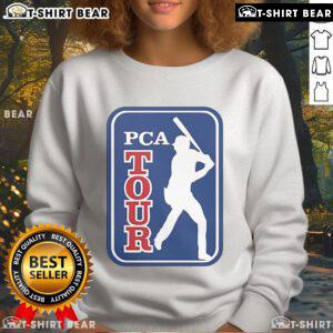 Pete Crow-Armstrong wearing an Official PCA Tour sweatshirt, showcasing style and sportsmanship in baseball attire.