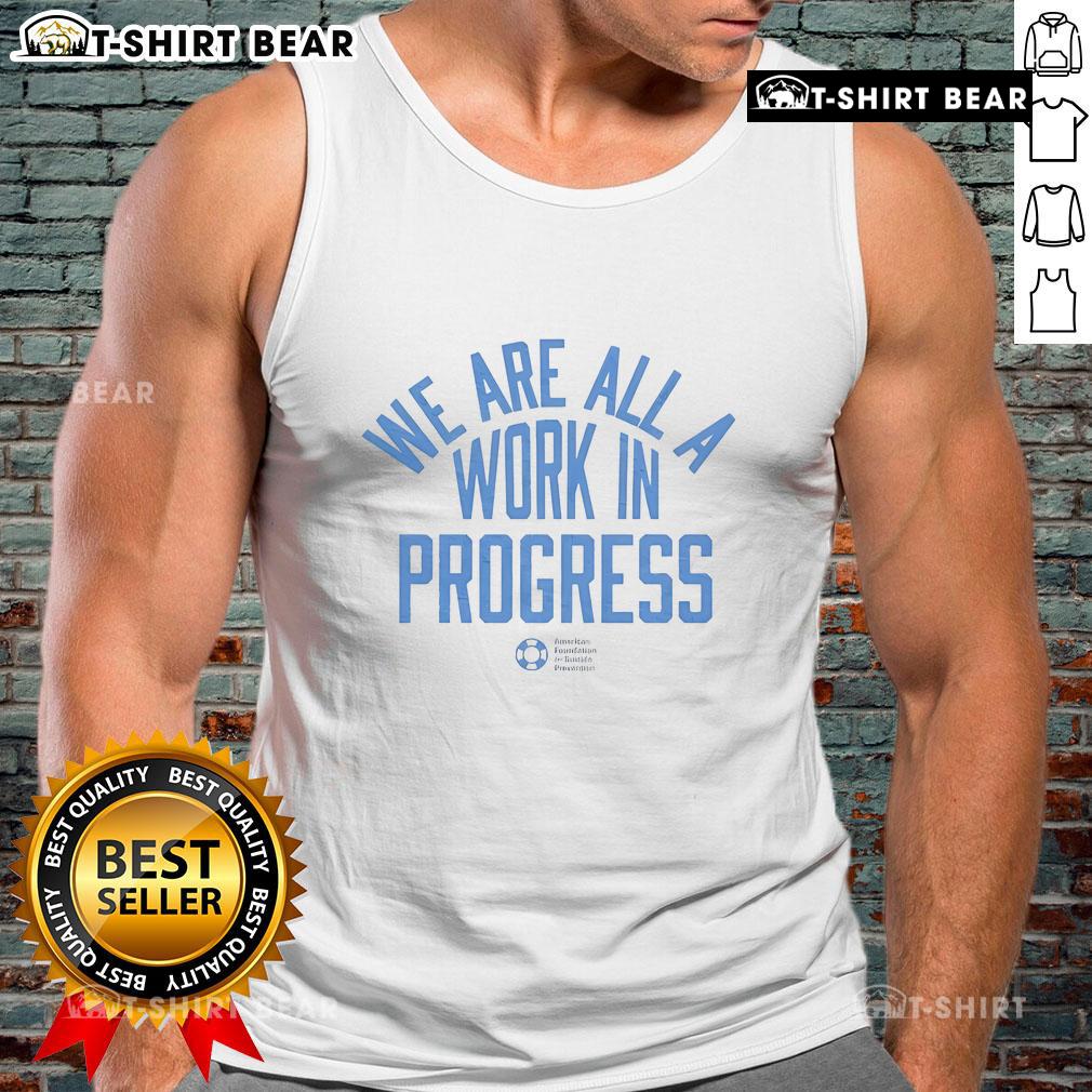 Alt Text: We Are All A Work In Progress tank top by AFSP - American Foundation for Suicide Prevention promoting mental health awareness.