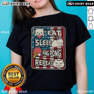 Patriotic ladies tee featuring a cute cat with a 'Eat Sleep Ping Pong Repeat' design, perfect for table tennis fans.