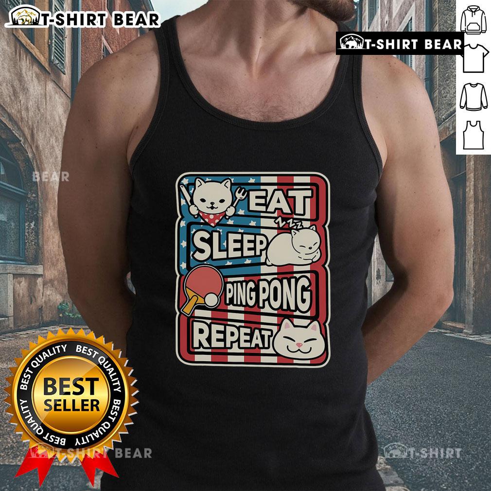 Adorable cat lounging in a patriotic tank top, perfect for ping pong enthusiasts: Eat, Sleep, Ping Pong, Repeat.