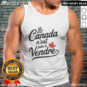 Pretty Le Canada Nest Pas A Vendre tank top design featuring 'Canada is not for sale' slogan in vibrant colors.