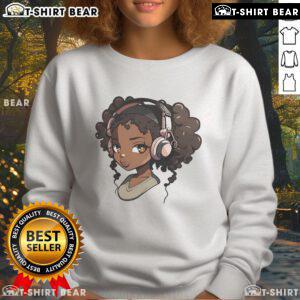 Stylish black girl wearing an Afro-themed anime sweatshirt, showcasing top anime and music inspired African American merch.