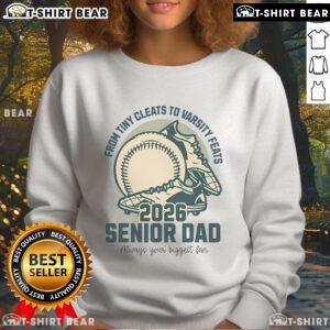 Alt Text: Top Baseball Senior Dad 2026 sweatshirt featuring tiny cleats and varsity feats design for proud baseball parents.