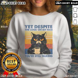 Cozy sweatshirt featuring a cat design and humorous text: 'Top Cat - Yet Despite The Look On My Face, You're Still Talking.'