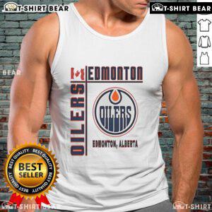 Top Edmonton Oilers Hockey tank top featuring Canada flag design, perfect for fans showing team pride.