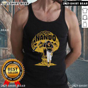 Fernando Tatis Jr. wearing a 'Nando Explosion' tank top, showcasing vibrant graphics and a sporty design.