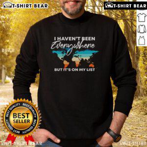 Cozy 'I Haven't Been Everywhere But It's On My List' sweatshirt for travel lovers, perfect for adventures and wanderlust.