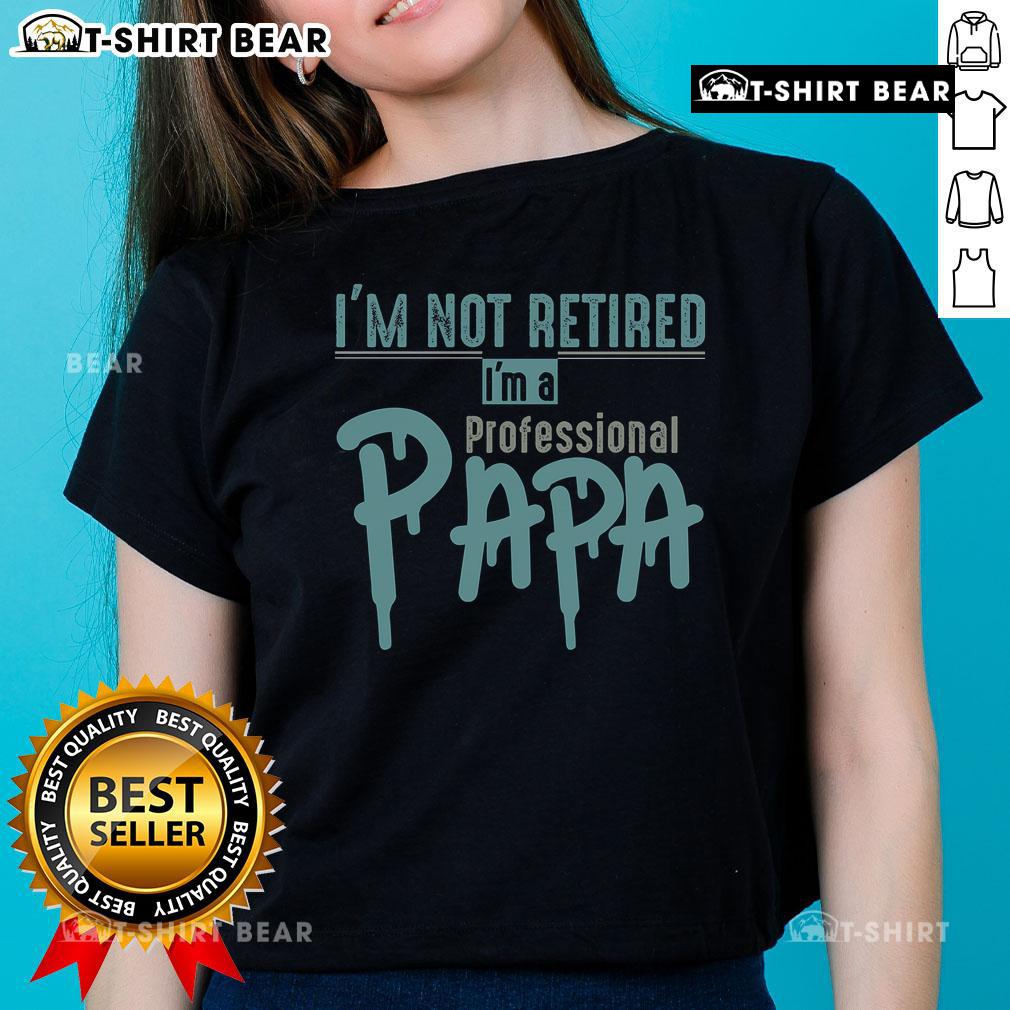 Top I'm Not Retired I'm A Professional Papa Ladies Tee in vibrant colors showcasing a playful design for proud dads.