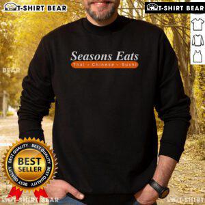 Cozy sweatshirt featuring Top Seasons Eats design with Thai, Chinese, and sushi motifs, perfect for food lovers.