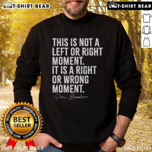 Cory Booker wearing a sweatshirt that says 'This Is Not A Left Or Right Moment,' promoting unity and bipartisanship.