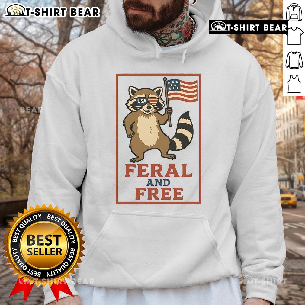 Alt Text: Official Feral and Free Raccoon America Flag Hoodie featuring a raccoon graphic and vibrant American flag colors.