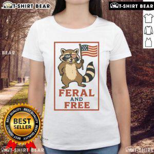 Alt Text: Feral and Free raccoon graphic on America flag ladies tee, perfect for patriotic animal lovers.