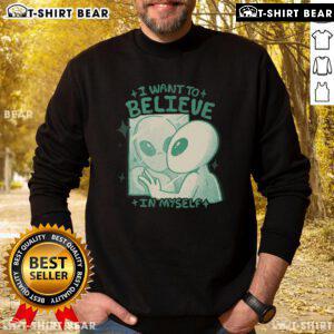 Cozy alien sweatshirt with 'I Want To Believe In Myself' text, perfect for fans of quirky, motivational apparel.