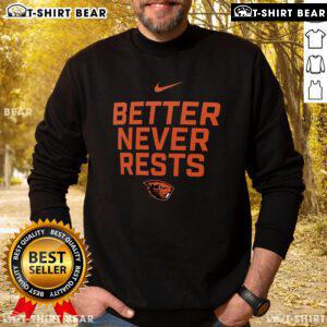 Alt Text: Official Oregon State Beavers Better Never Rests Sweatshirt displayed in black, showcasing the team's logo and design.