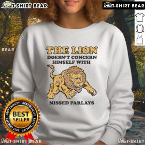 Alt Text: Official 'The Lion Doesn't Concern Himself With Missed Parlays' sweatshirt featuring bold typography and a stylish design.
