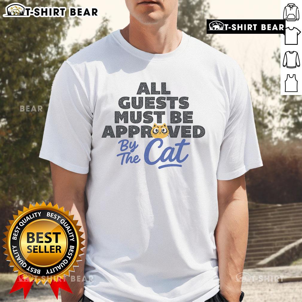 Top All Guests Must Be Approved By The Cat T-Shirt featuring a humorous cat graphic, perfect for cat lovers and pet enthusiasts.