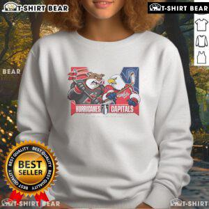 Top Dallas Stars vs Carolina Hurricanes 2025 Eastern Conference Semi-Finals sweatshirt featuring team mascots.