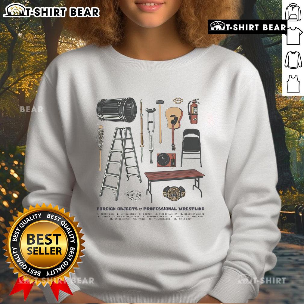 Top Foreign Objects of Professional Wrestling sweatshirt featuring iconic wrestling memorabilia and vibrant graphics.