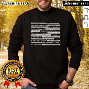 Top I Didn't Vote For Him In Multiple Languages Sweatshirt featuring bold text design for political statement fashion.