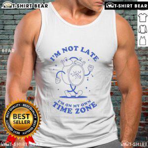 Trendy 'I'm Not Late, I'm On My Own Time Zone' clock tank top displayed on a mannequin, perfect for casual wear.