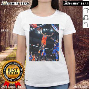 Alt Text: Jalen Williams soaring for a score in black game frames, featured on an Oklahoma ladies' tee shirt.