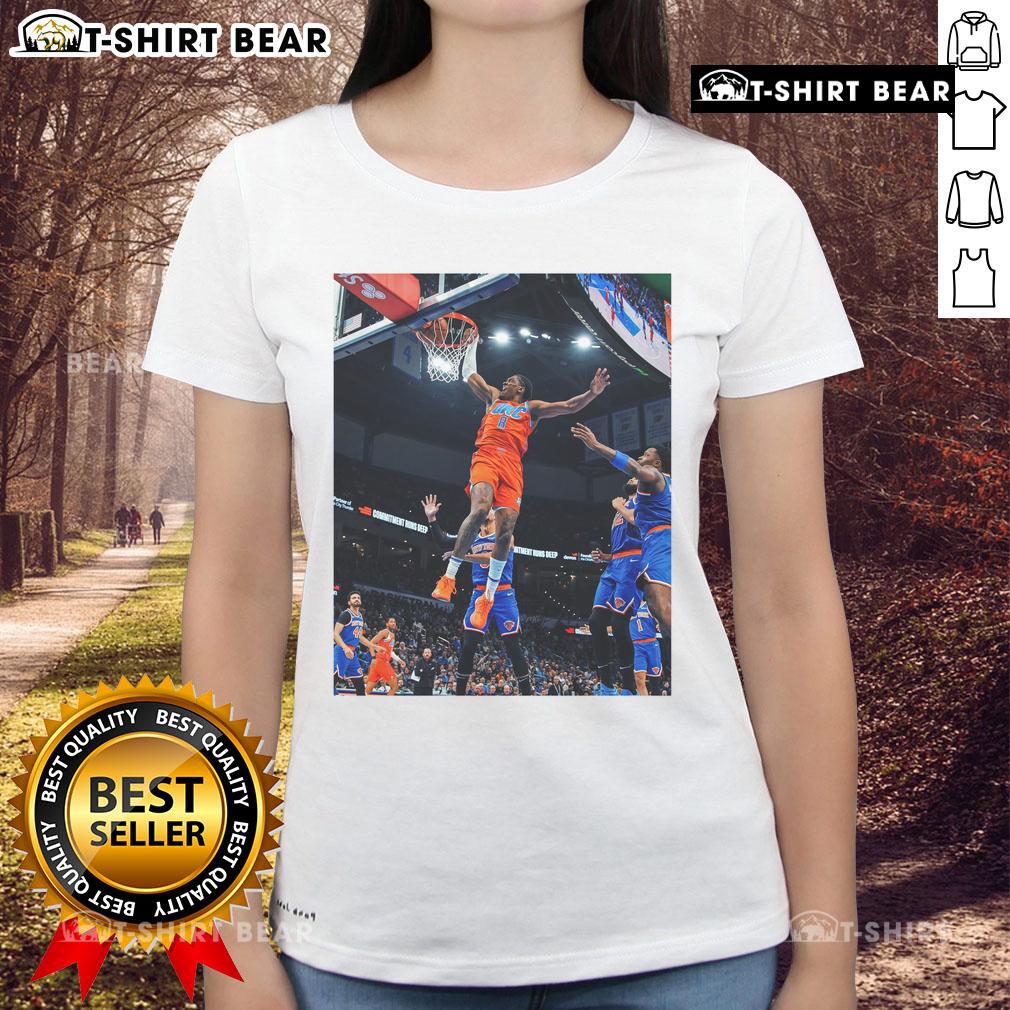 Alt Text: Jalen Williams soaring for a score in black game frames, featured on an Oklahoma ladies' tee shirt.