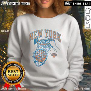 Top NBA X Grateful Dead X Knicks sweatshirt featuring vibrant graphics and cozy design for fans of basketball and music.