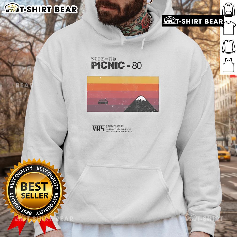 Cozy 'Top Picnic 80' VHS holiday season hoodie displayed on a wooden table, perfect for festive gatherings.
