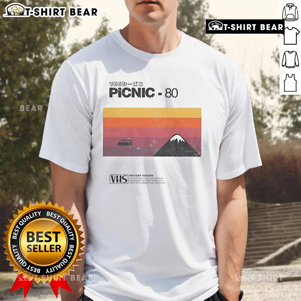 Top Picnic 80 VHS Holiday Season T-Shirt featuring retro design, perfect for festive gatherings and nostalgic style.