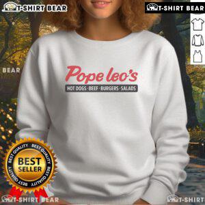 Cozy sweatshirt featuring Top Pope Leo's logo, showcasing hot dogs, beef burgers, and salads for food lovers.