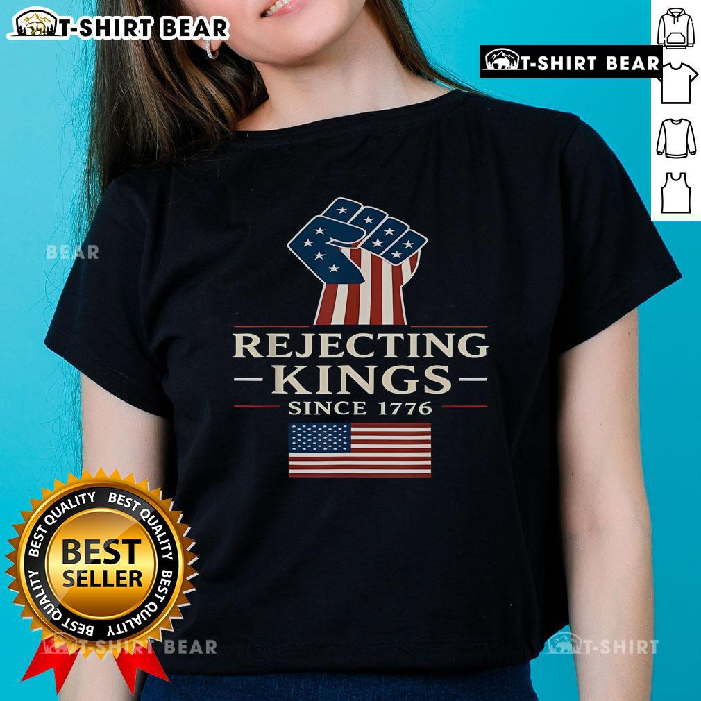 Top Rejecting Kings Since 1776 hand design on American flag ladies tee for patriotic fashion enthusiasts.