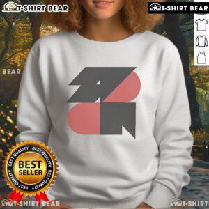 Cozy Top Spoon Geo Sweatshirt featuring geometric patterns, perfect for casual wear and stylish layering.