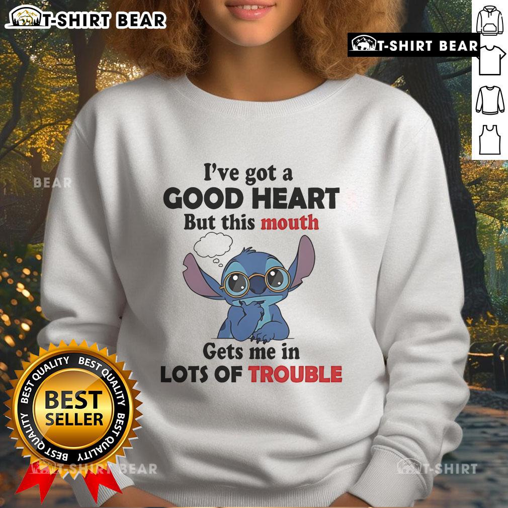Alt Text: Cozy 'I've Got A Good Heart But This Mouth Gets Me In Lots Of Trouble' sweatshirt, perfect for casual wear and making a statement.
