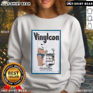 Top Vinylcon Philadelphia May 10-11, 2025 poster design featuring vibrant graphics and a stylish sweatshirt.