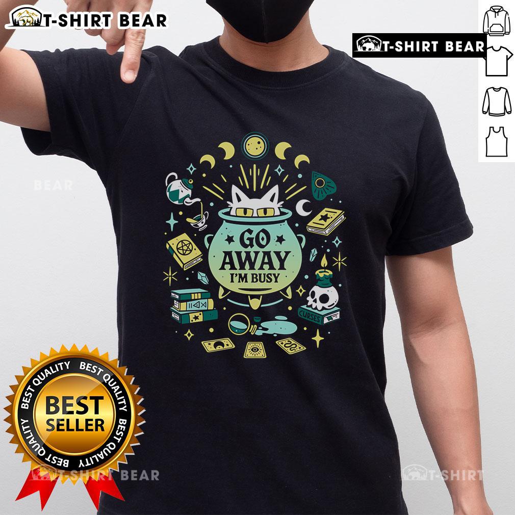 Funny witch cat at work graphic tee with Go Away I'm Busy text, perfect for cat lovers and Halloween enthusiasts.