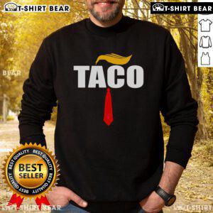Hot Taco Trump Hair Tie Sweatshirt featuring a vibrant taco design and fun Trump-inspired graphics.